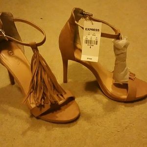 Express size 6 fringed suede heels. Never worn. Ta